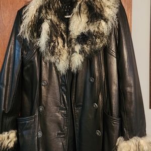 Beautiful leather coat with authentic fur.
